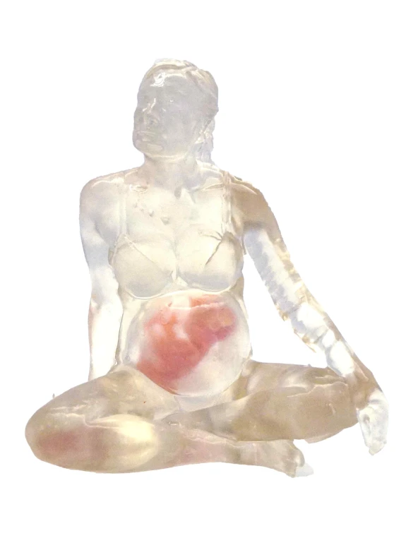 Glazen beeldje met baby in buik